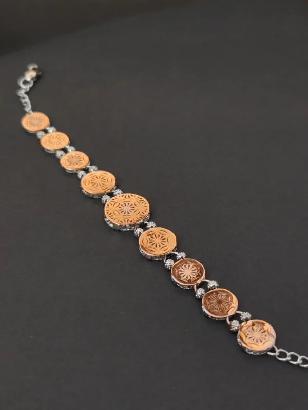 antique dual tone coin link bracelet