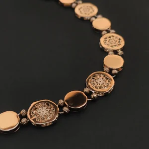 antique dual tone coin link bracelet