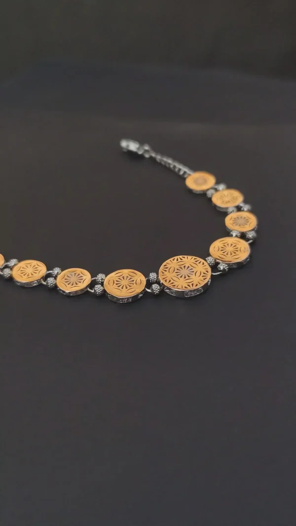 antique dual tone coin link bracelet