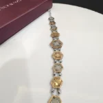 hexagon dual tone charm bracelet