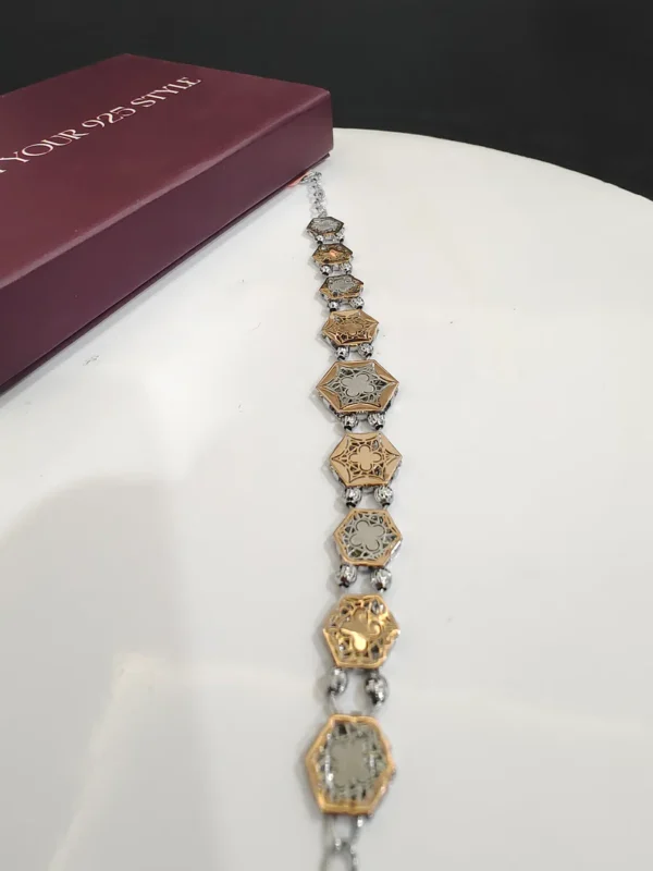 hexagon dual tone charm bracelet
