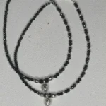 noir charm anklet video