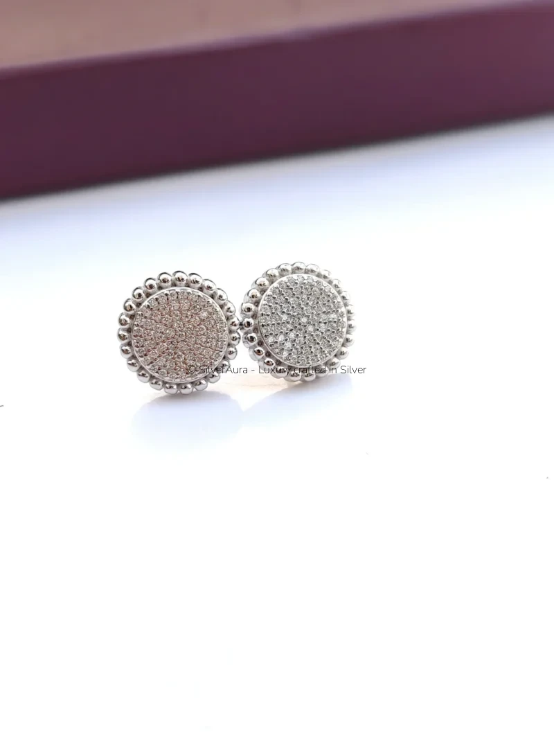 Pave disc studs in 925 sterling silver with milgrain border