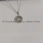 Starburst CZ pendant necklace, close-up view