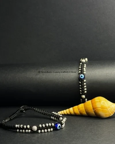 Protective evil eye charm anklet with silver-toned accents