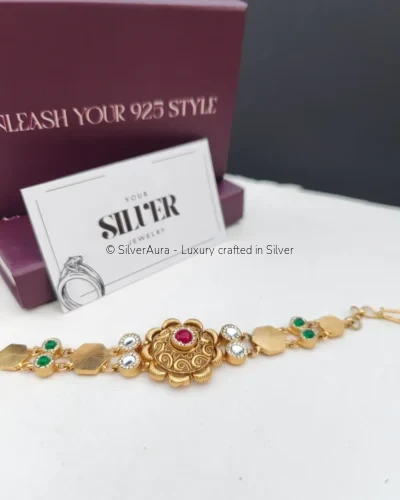 Ruby gold bracelet, close-up of ruby centerpiece