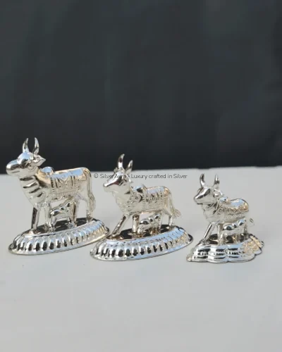 Kamdhenu Mata silver idol with calf, front view