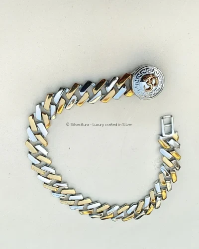 Om silver bracelet, close-up view