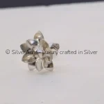 Rajshree Pushp silver flower, placed at deity feet