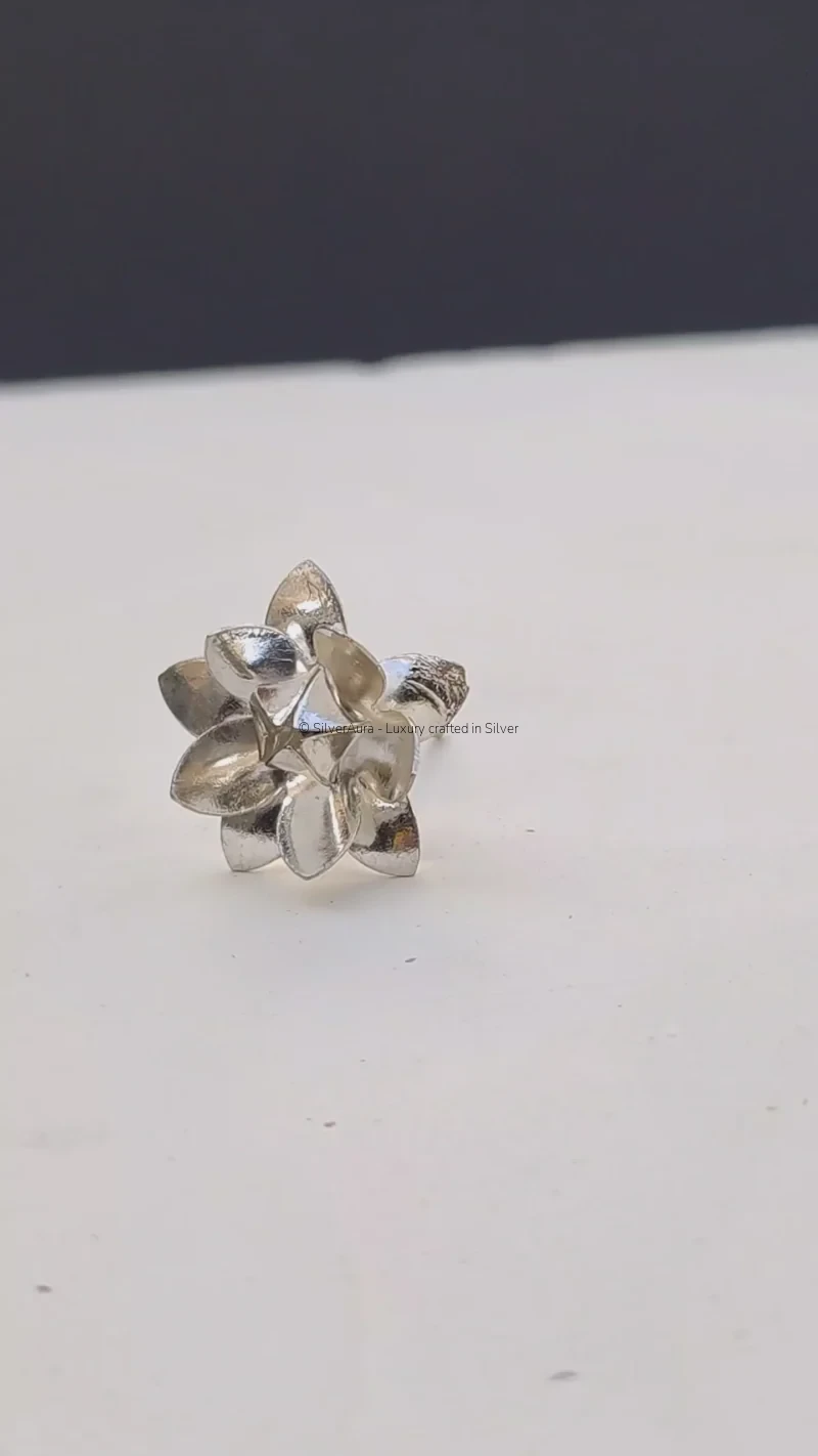 Rajshree Pushp silver flower, placed at deity feet