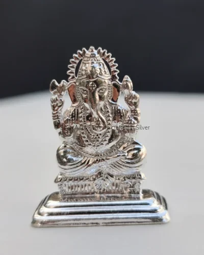 Shri Ganesh Ji silver murti, seated in blessing pose