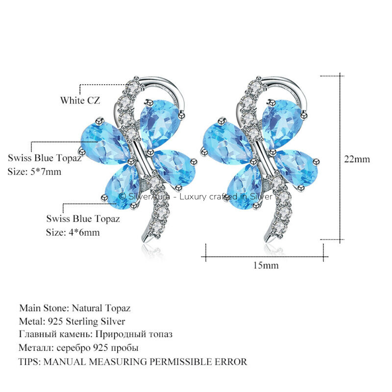 Butterfly-shaped gem earrings, close-up view