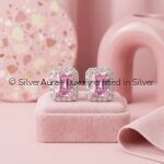 Rectangle solitaire pink silver studs worn on ear