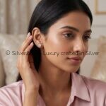 Solitaire studs prongs worn on ear