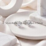 Solitaire studs prongs, close-up view