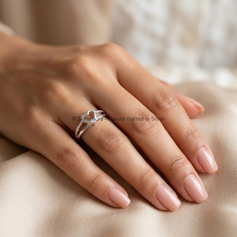 Fellow heart ring worn on finger