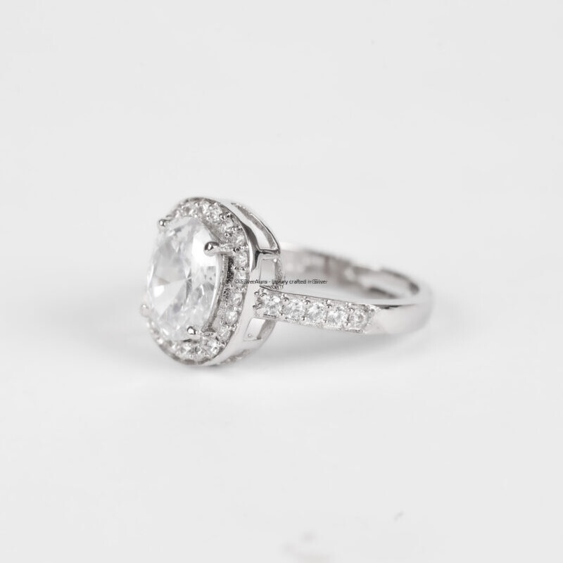 Pure solitaire silver ring worn on hand
